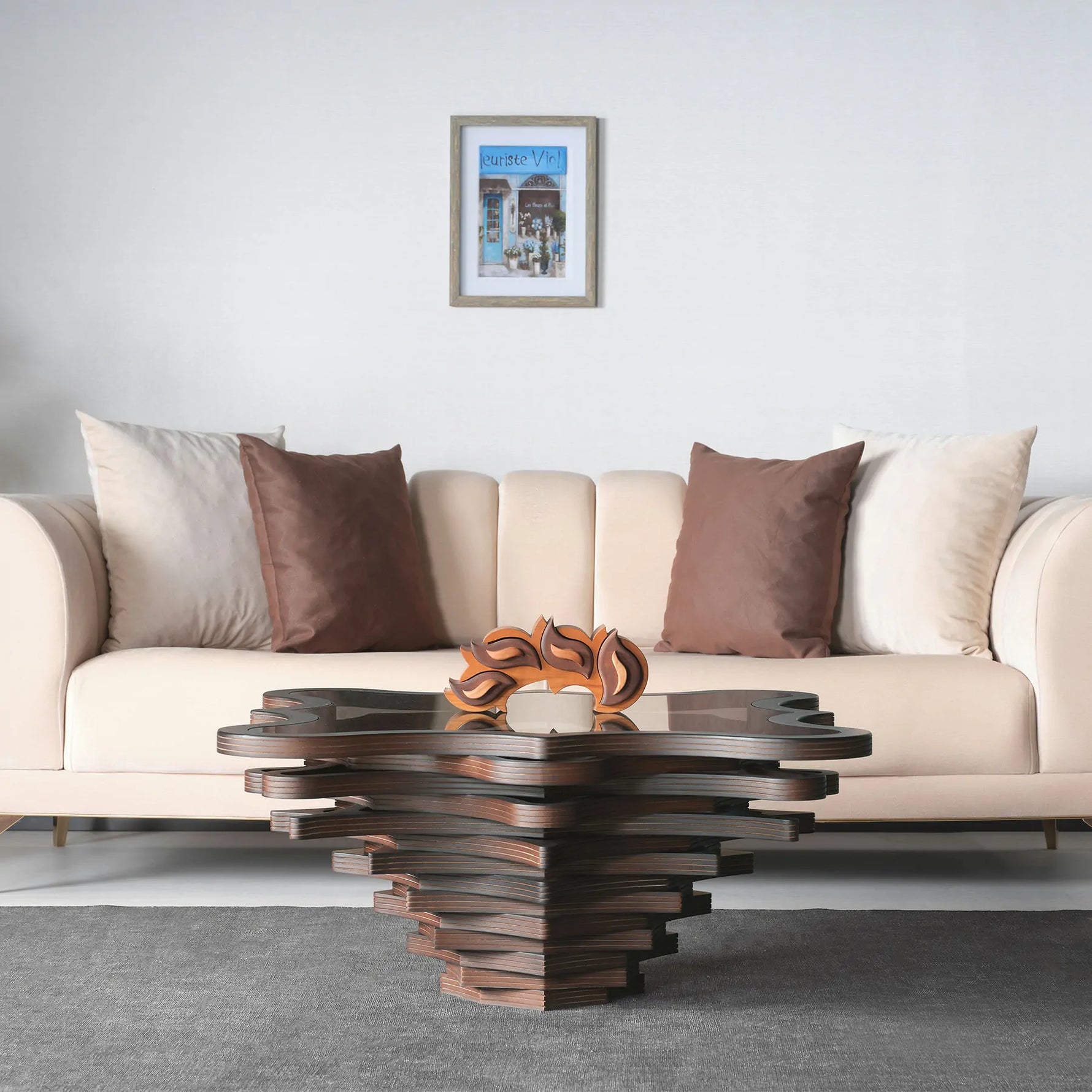 Sculptural coffee table with organic petals and tiered wood design
