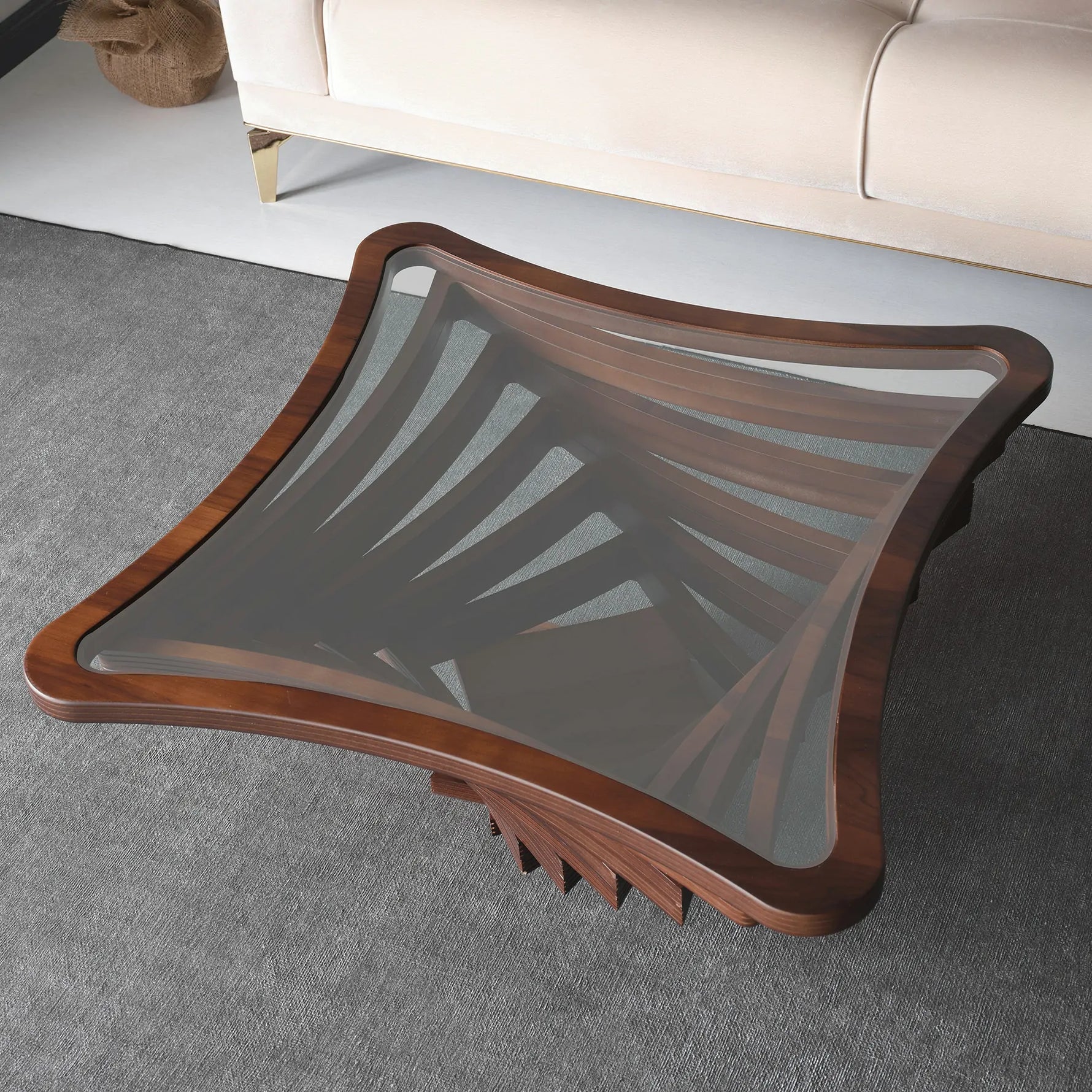 Modern coffee table with curved-edge glass top