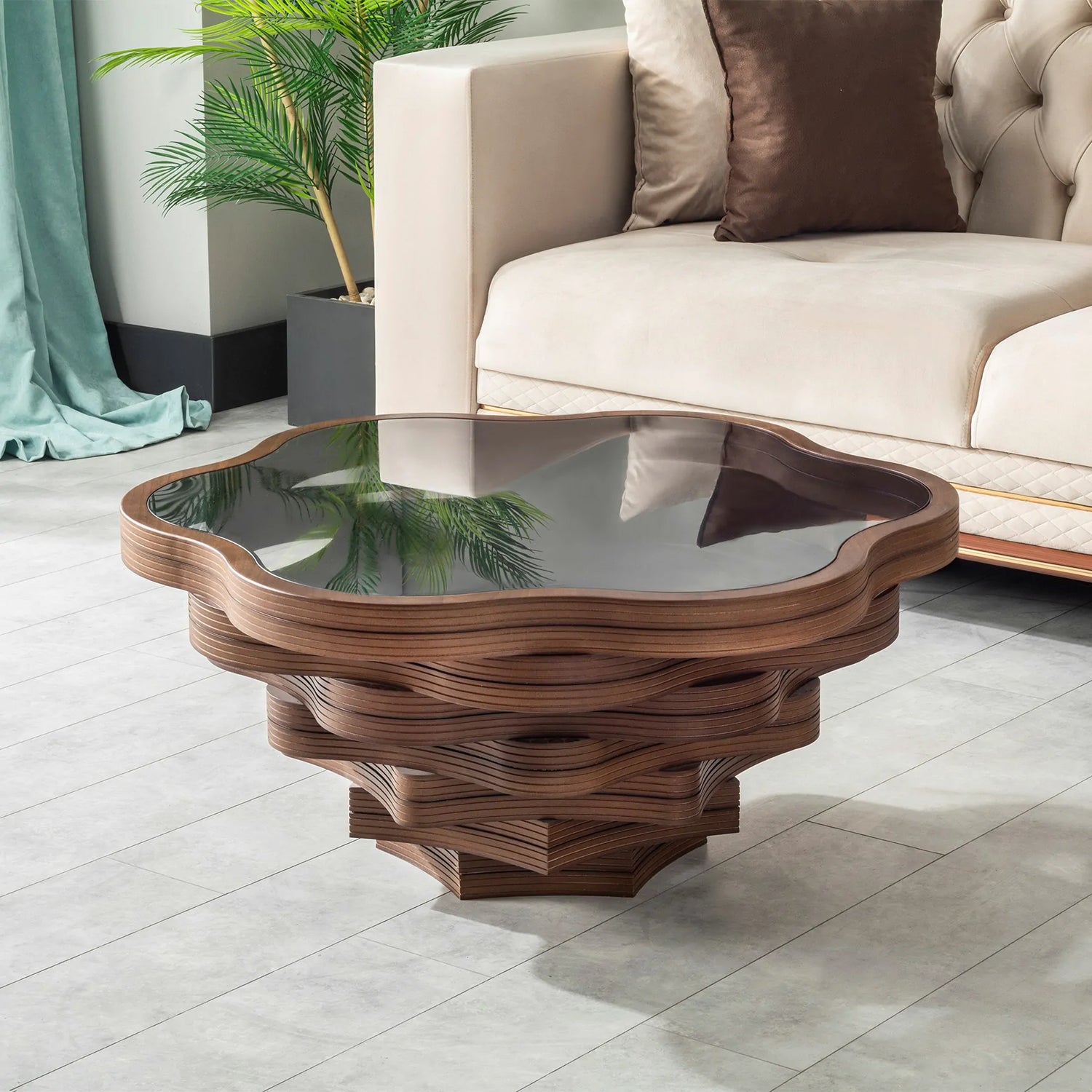 A floral-inspired layered walnut coffee table with a tempered glass top, placed in a modern living room setting.