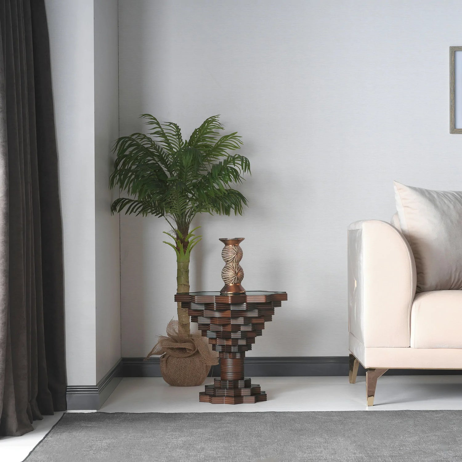 Bold sidetable with asymmetrical glass and wood surfaces