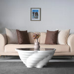 Modern vortex coffee table with curved layered form