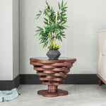 Matching end table with sculptural base and glass top
