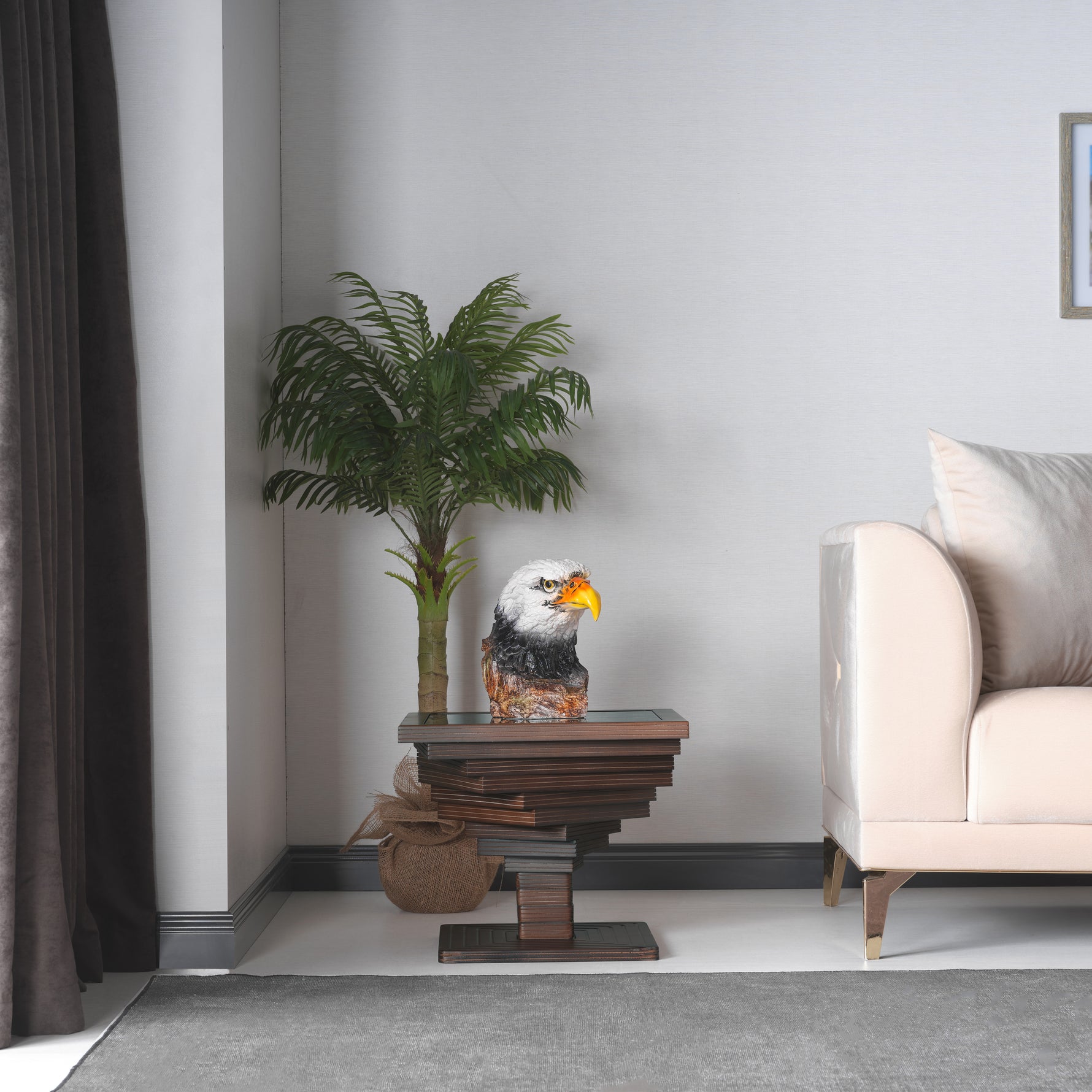 "Artistic twisted-layer design end table with a durable black tempered glass surface."